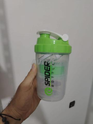 Shaker avec compartiments pour whey et compléments