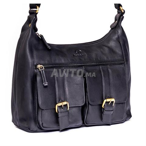 حقيبة يد جلد طبيعي بحمالة