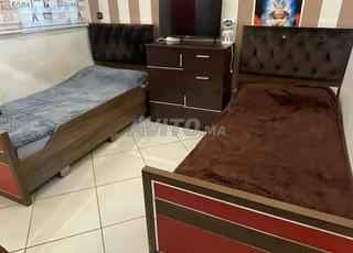 أسرة مع مراتب