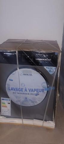 ثلاجة neuf وآلة غسيل نوع regal neuf