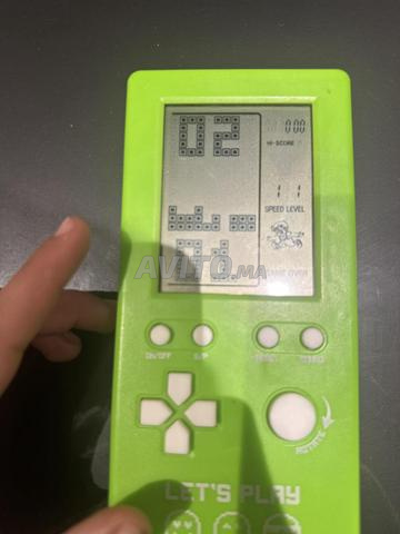 وحدة تحكم ألعاب مع 8 ألعاب أتاري