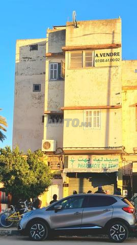 منزل مكون من محل تجاري 122 متر مربع و 3 طوابق