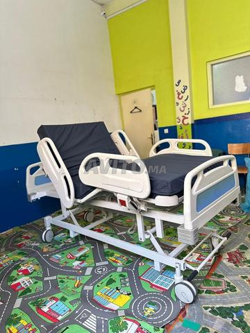 سرير طبي كهربائي