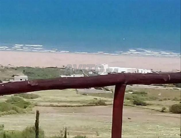 أرض بالقرب من البحر وطريق آسفي