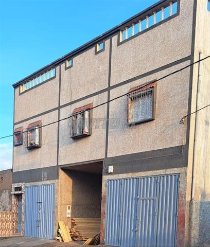 أرض ومنزل للبيع