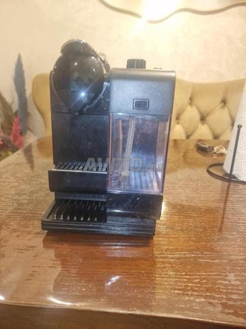 ماكينة قهوة De’Longhi مع جهاز تكوين رغوة الحليب