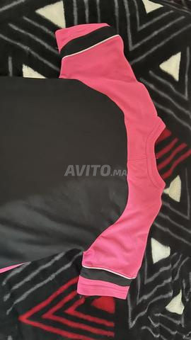 قميص نايك للركض زهري مقاس 10-11 سنة