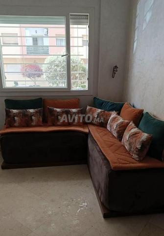 صالون على شكل حرف L ذو وجهين من جلد الغزال