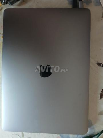 MacBook اير M1 25 و hp Probook 250g