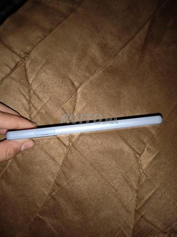 Téléphone en bon état avec 128G et 6 ram