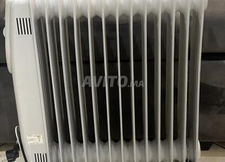 مدفأة كهربائية تعمل بالزيت