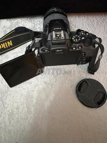 Nikon D5600 عدسة sigma 18-200mm contemporary