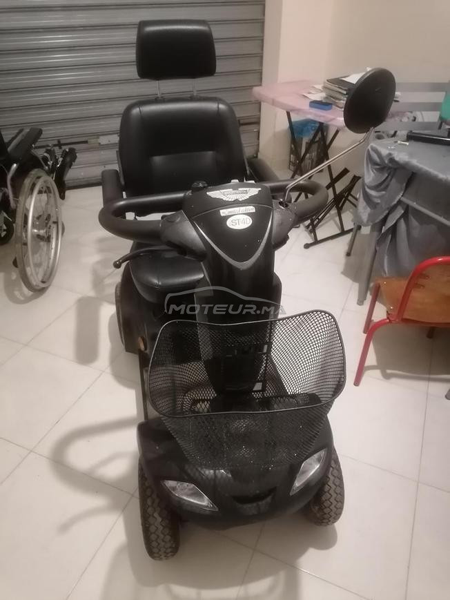سيارة للمقعدين كهربائية