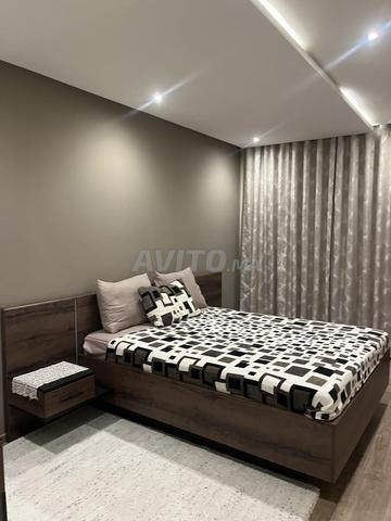 Meuble lit et deux coiffeuses