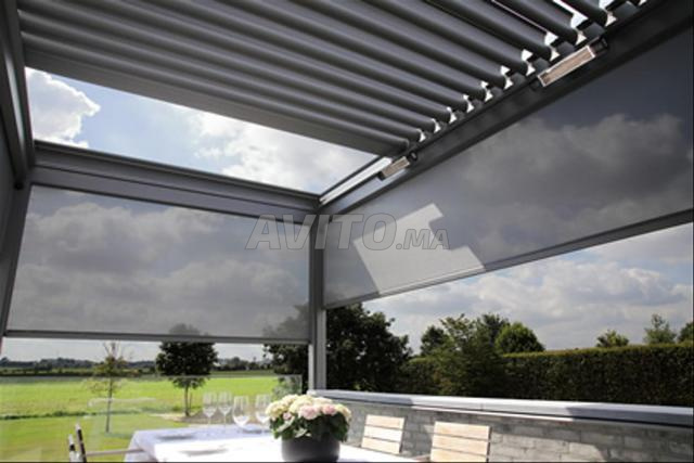 PERGOLA BIOCLIMATIQUE À LAMES RÉTRACTABLES
