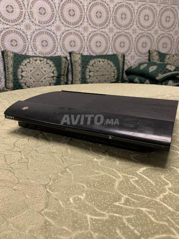 PS3 super slim 500go 2 manettes flashé