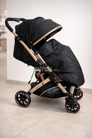 Poussette valise 2 faces avec cash Promo limitée