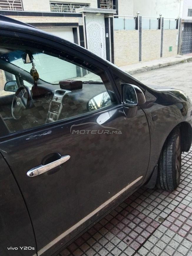une voiture a vendre kia carens