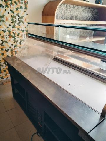 2 présentoirs professionnels à vendre