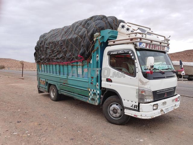 Mitsubishi canter statiya - 2