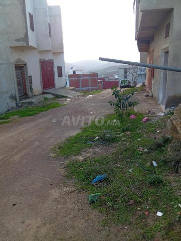 Terrain de 78 mètres, propriété foncière à la lotissement Al Wikaya, avec 2 façades - 2