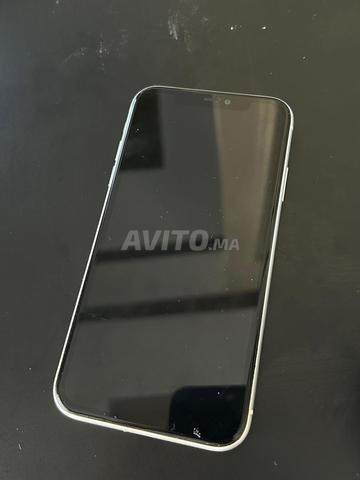 Iphone 11 batterie changée 97 tout original