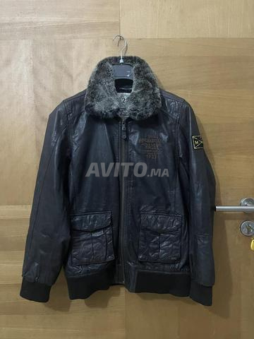 سترة ماكغريغور جلد ياقة في حديد مشغول أصلي