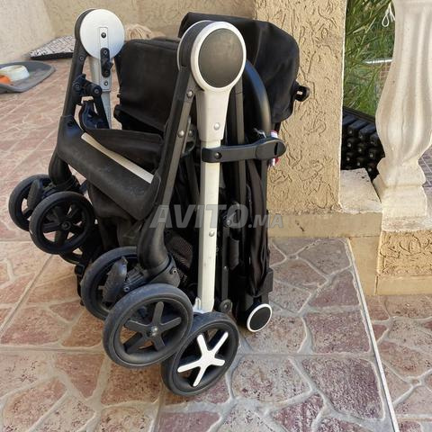 عربة أطفال للمسافر