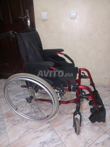 Fauteuil roulant pliable كرسي متحرك