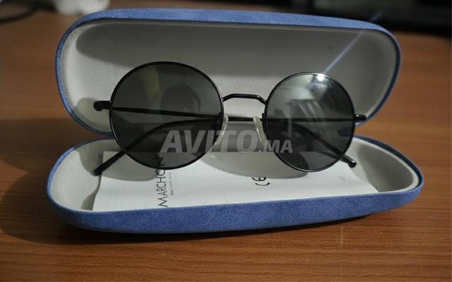 Lunettes de soleil neuves rondes DKNY