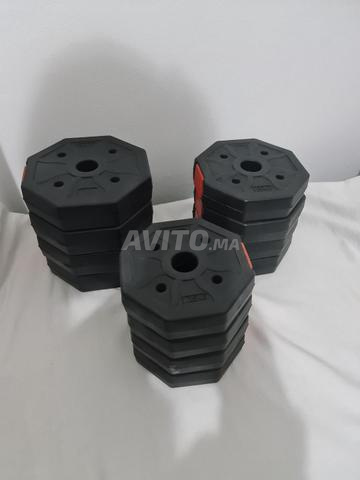 12 أقراص للأثقال 2kg و 1.5kg و 1.25kg