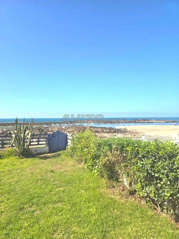 Etage de villa indépendante front de mer