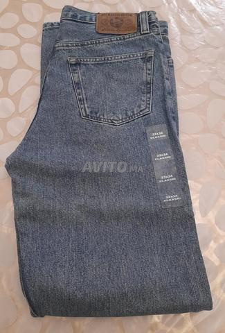 جين أصلي ماركة إيدي باور مقاس 33x34 - 2