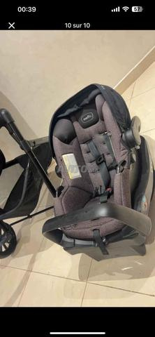 عربة أطفال evenflo pivot