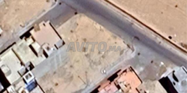 أرض R2 محفظة 118م2 - طريق الدار البيضاء (1 كم من Chez Ali)