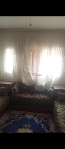 Deux étages et une chambre avec commodités sur le toit