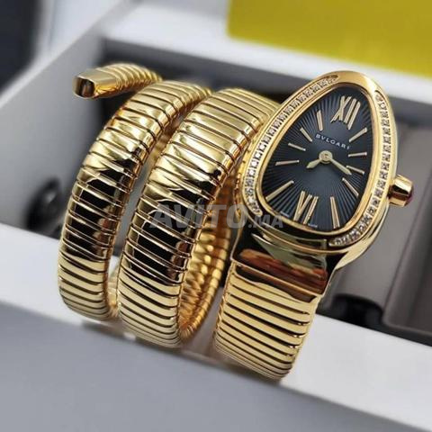 ساعة يد نسائية فاخرة بتصميم Serpenti