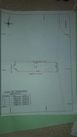 أرض للبيع قرب مركز آيت قمرة