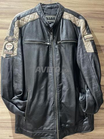 جاكيت جلد مقاس XL