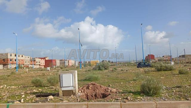 بقعة للبيع مجهزة بالتنازل لودادية الأطلس