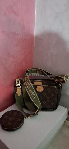 Luis Vuitton master copie occasion très bon état