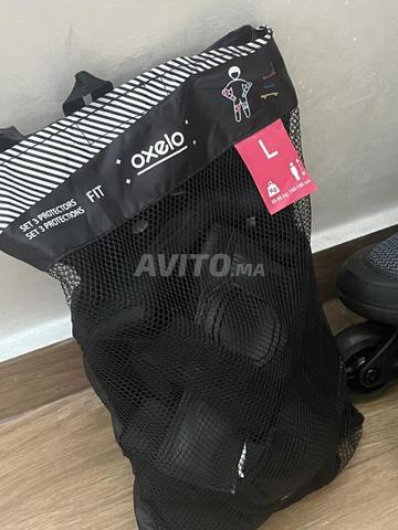 Rollers Oxelo taille 42 et kit de protections