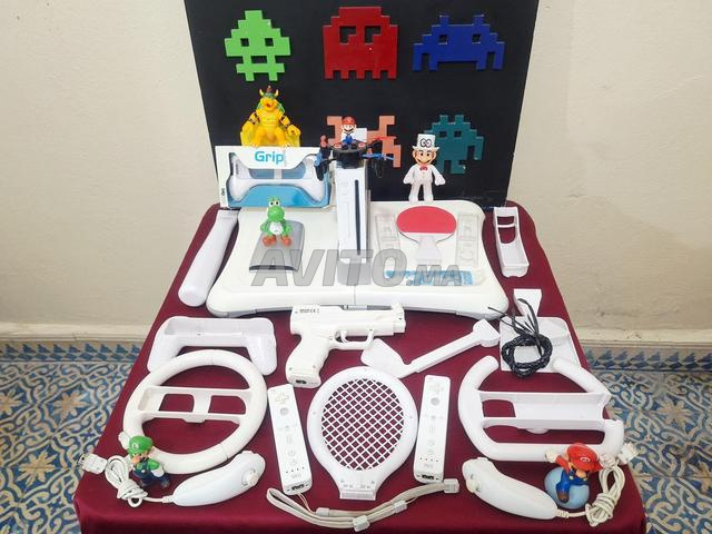مجموعة Nintendo Wii 50 لعبة بالإضافة إلى الملحقات