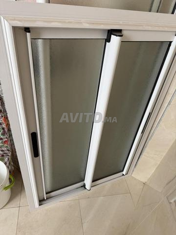 Fenêtre coulissante en aluminium