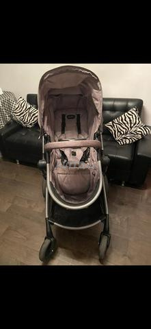 عربة أطفال مع مقعد سيارة في حالة ممتازة