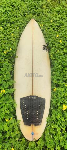 planche de surf 6'6 avec les drivers