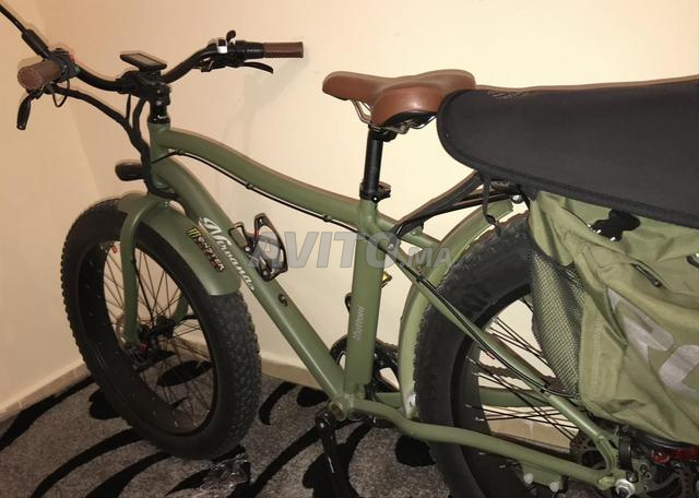 دراجة كهربائية بدينة لون أخضر عسكري