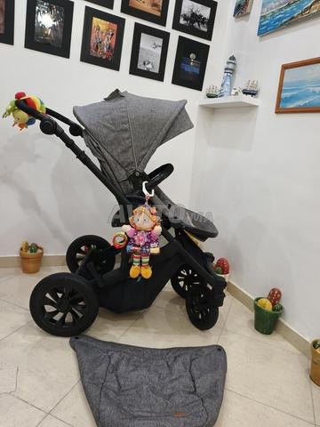Poussette 2 faces originale comme neuf