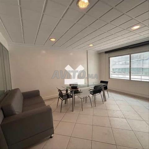 125049-Bureau à louer à 15000DH à Triangle D'Or