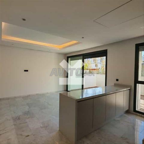 163790-Appt à louer à 9500DH à Casablanca Finance - 2
